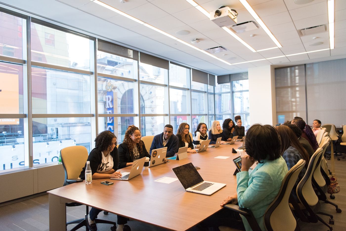 Professional meeting in a sunlit conference room