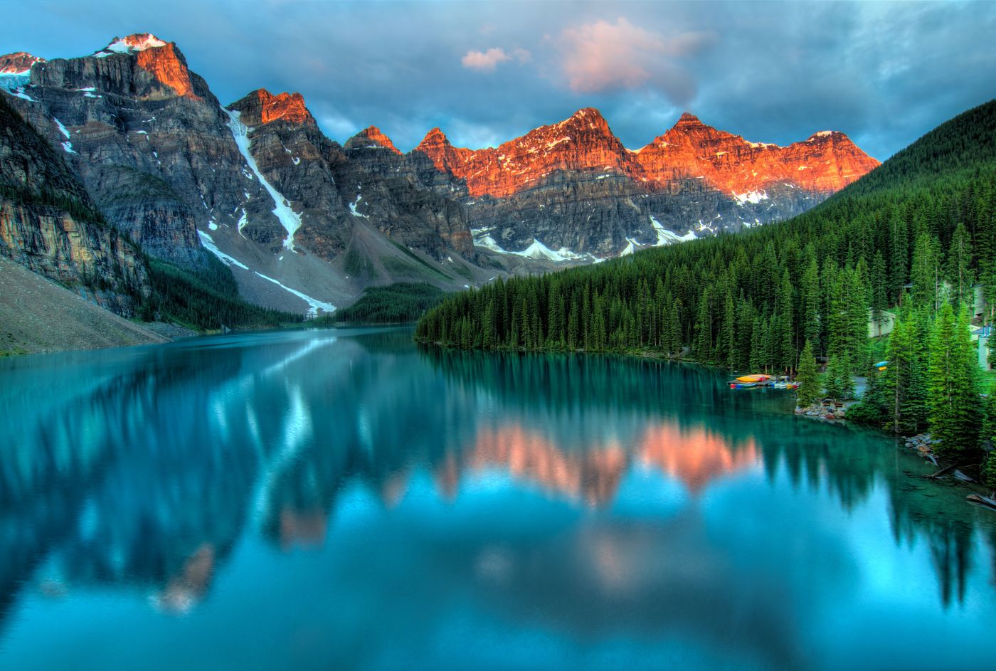 Mountain peaks reflected in a clear alpine lake